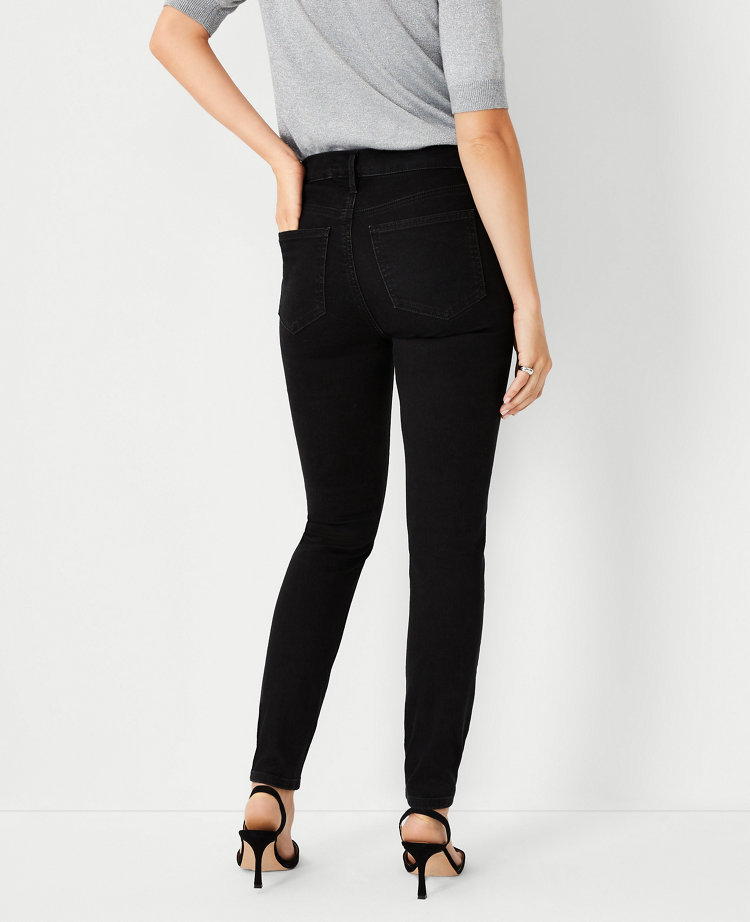 Mid Rise Skinny Jeans in Jet Black Wash