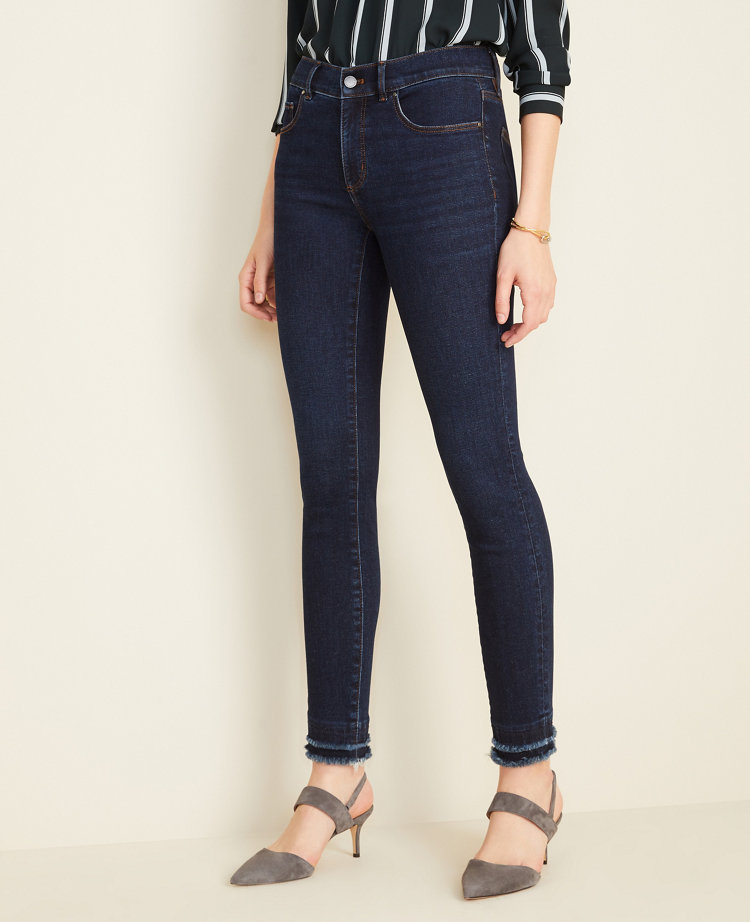 wonderfit mid wash denim skinny jeans