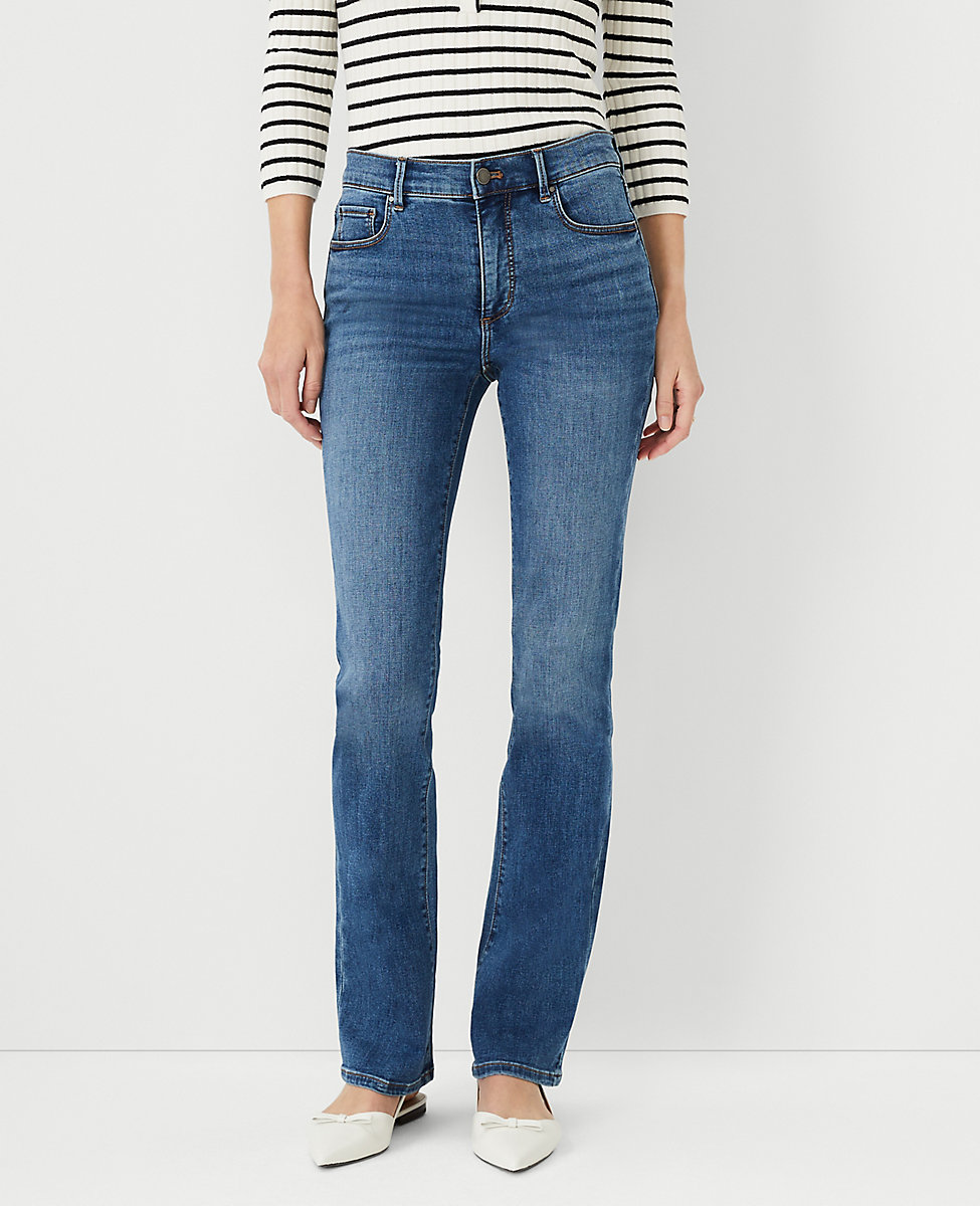 Sculpting Pocket Mid Rise Boot Cut Jeans in Mid Stone Wash