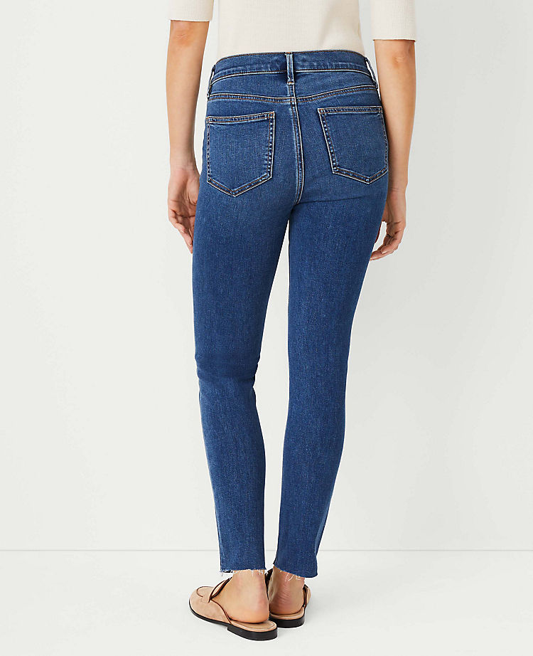 Petite Sculpting Pocket Mid Rise Skinny Jeans in Mid Stone Wash