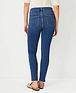 Petite Sculpting Pocket Mid Rise Skinny Jeans in Mid Stone Wash carousel Product Image 2