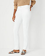 Petite Curvy Sculpting Pocket Mid Rise Slim Boot Cut Jeans in White carousel Product Image 1