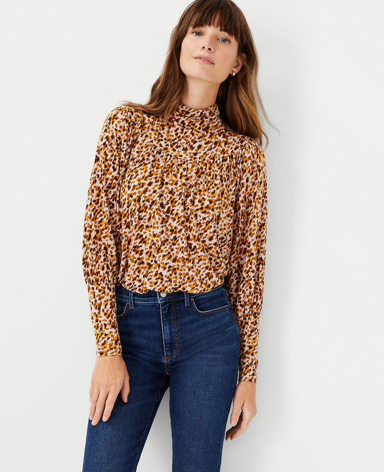 Animal print turtleneck outlet top