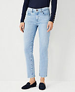 Petite Sculpting Pocket Mid Rise Taper Jeans in Light Vintage Indigo Wash carousel Product Image 3