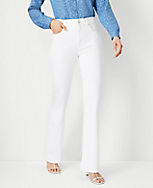 Petite Sculpting Pocket Mid Rise Boot Cut Jeans in White carousel Product Image 1