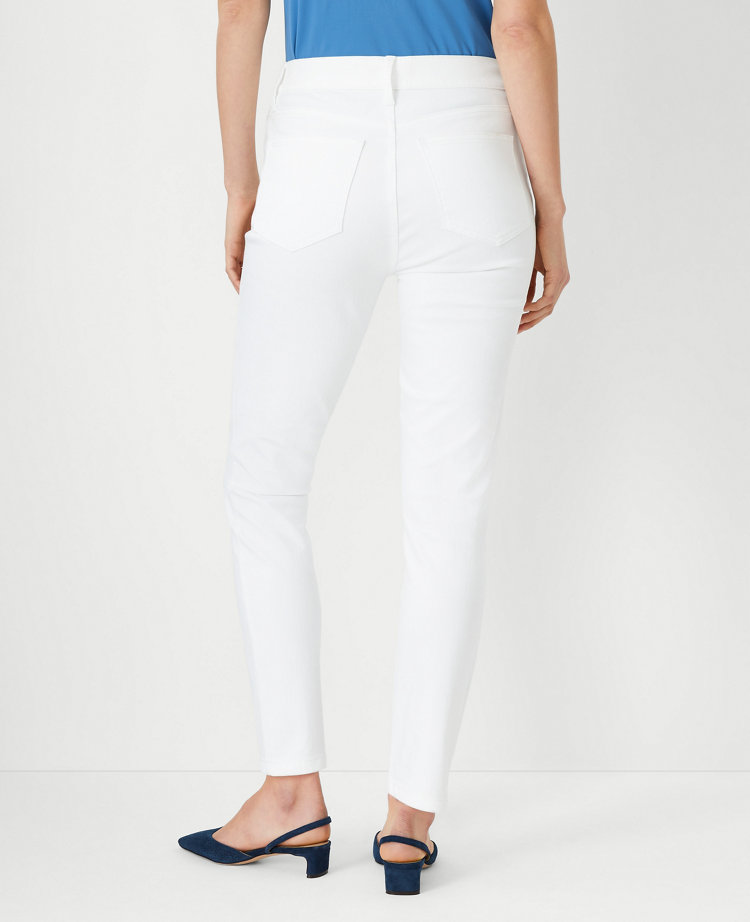 Ann Taylor Petite Curvy Sculpting Pocket Mid Rise Skinny Jeans in White Size 00 Women's