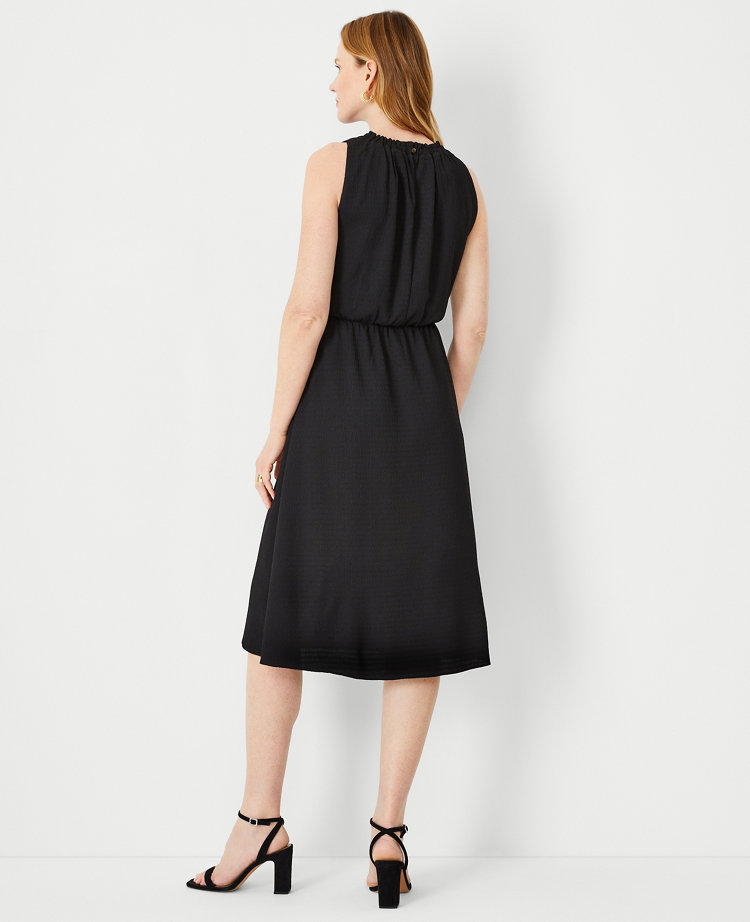 Shali sleeveless collared fit and flare dress.