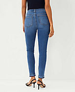 Petite Curvy Sculpting Pocket High Rise Skinny Jeans in Classic Mid Wash carousel Product Image 2