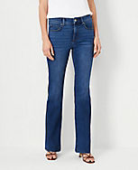Mid Rise Boot Cut Jeans in Classic Mid Wash - Curvy Fit carousel Product Image 1
