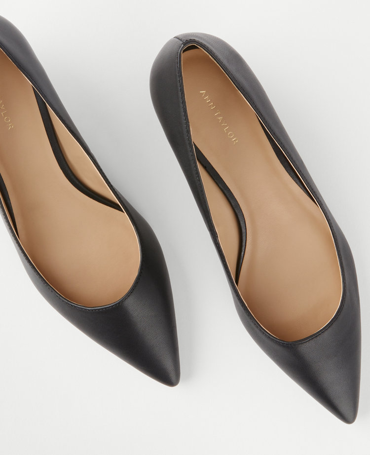 Black leather kitten outlet heel pumps