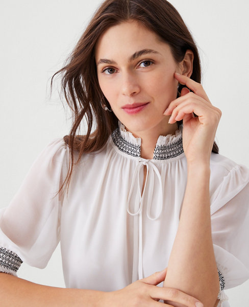 Embroidered Smocked Tie Neck Top