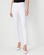 Mid Rise Skinny Jeans in White - Curvy Fit carousel Product Image 1