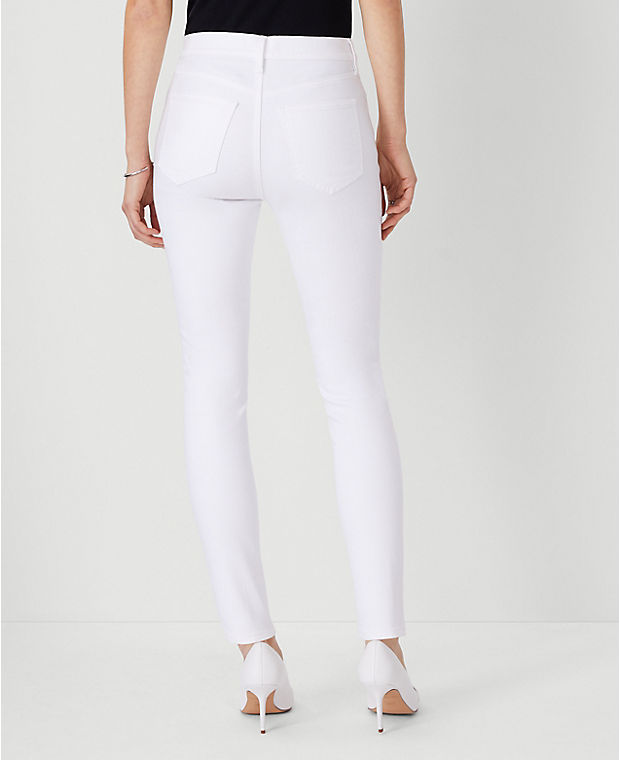 Petite Mid Rise Skinny Jeans in White - Curvy Fit