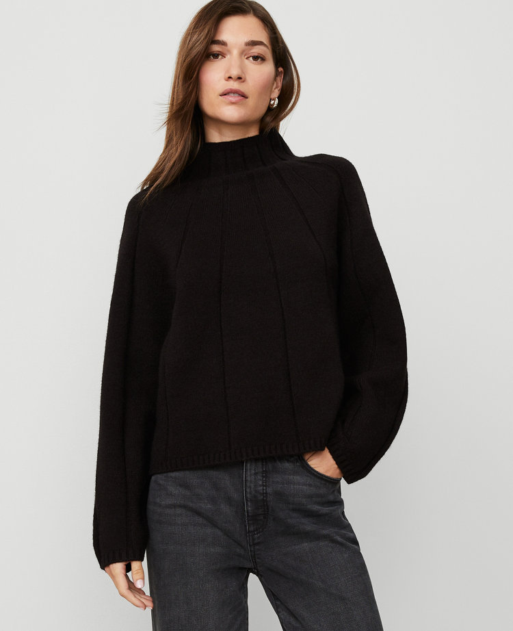 Traveling Stitch Turtleneck Sweater