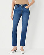 Petite Mid Rise Tapered Jeans in Authentic Light Indigo Wash carousel Product Image 1