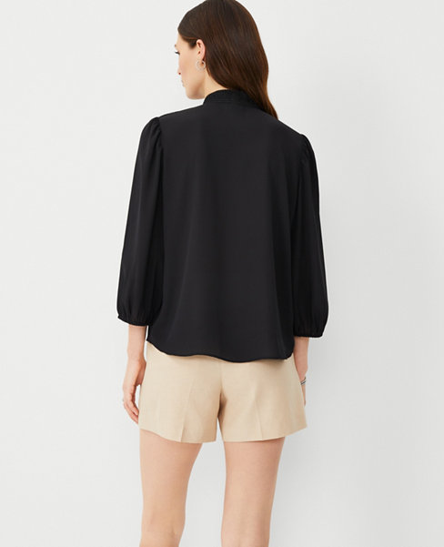 Embroidered Placket Mock Neck Top