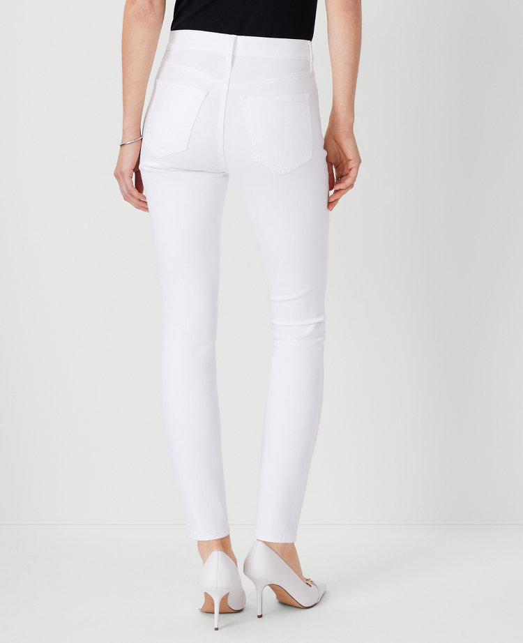 Petite Mid Rise Skinny Jeans in White