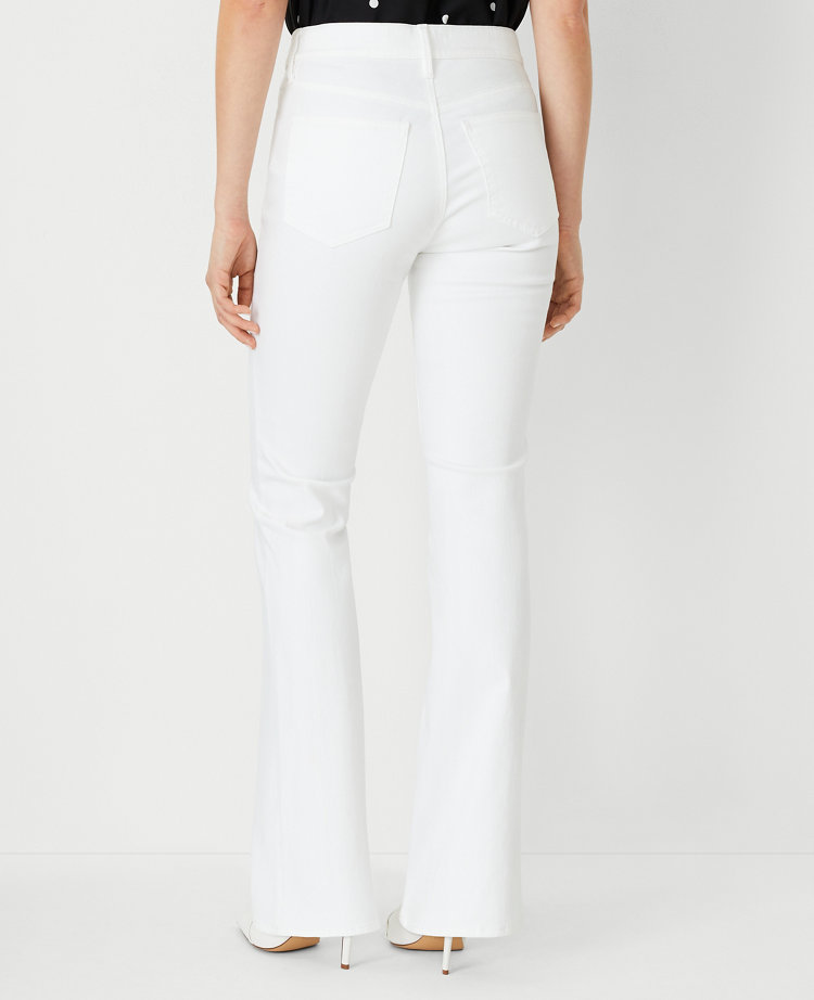 Mid Rise Boot Jeans in White - Curvy Fit