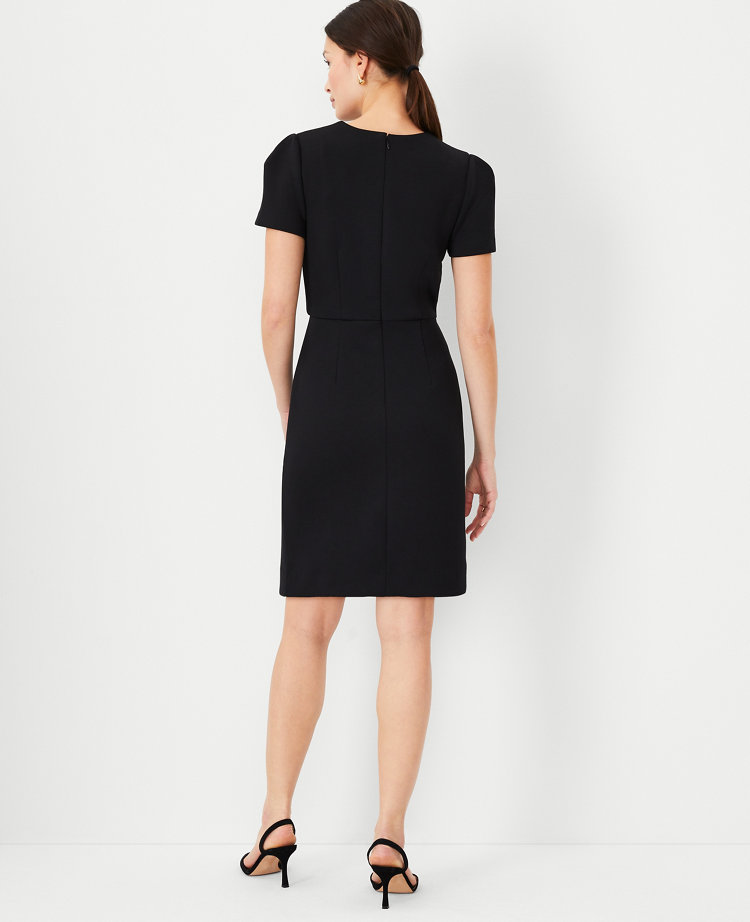 Puff-sleeve black sheath dress