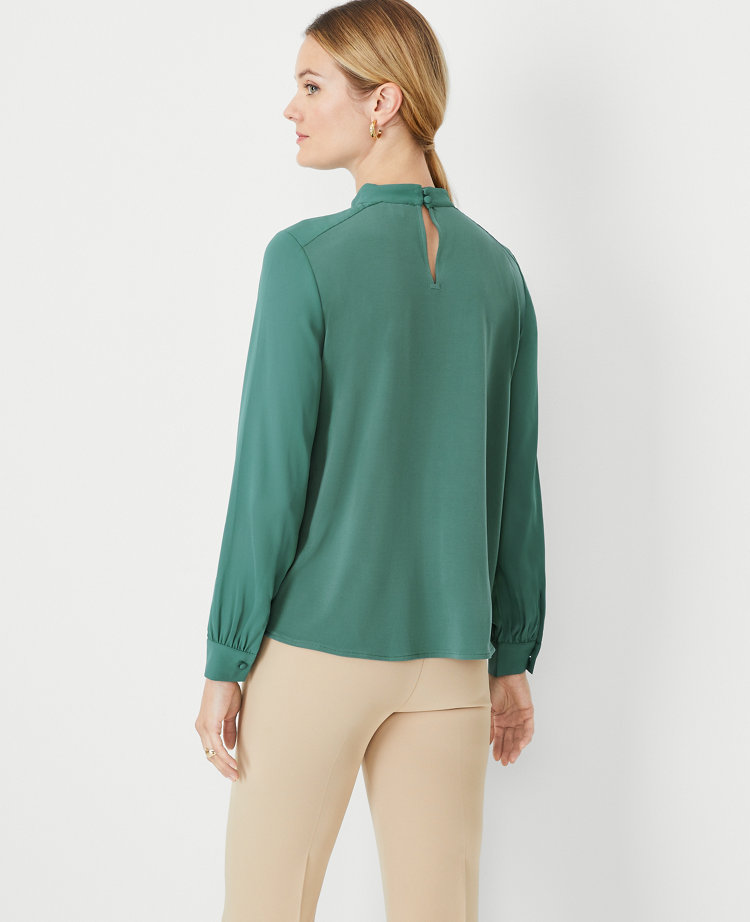 Mixed Media Pleat Front Mock Neck Top