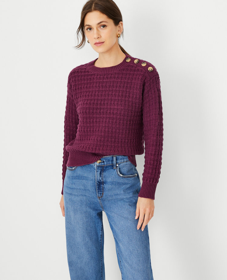 Jumper with discount buttons on shoulder