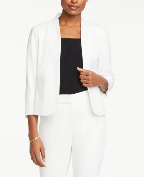 white collarless jacket