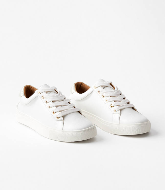 white slip on tennis shoes