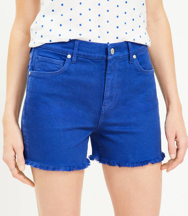 High Rise Frayed Cut Off Denim Shorts in Staple Mid Indigo Wash