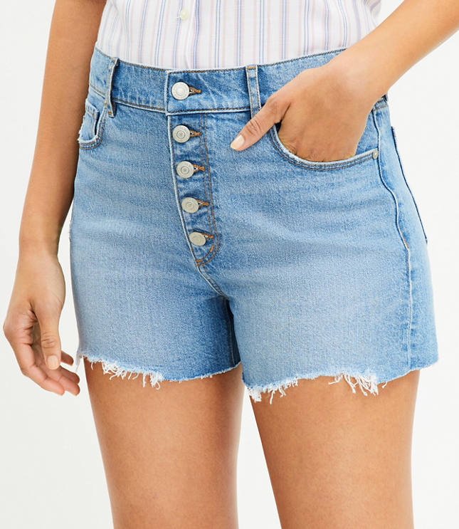 Button Front High Rise Destructed Cut Off Denim Shorts in Mid Indigo Wash