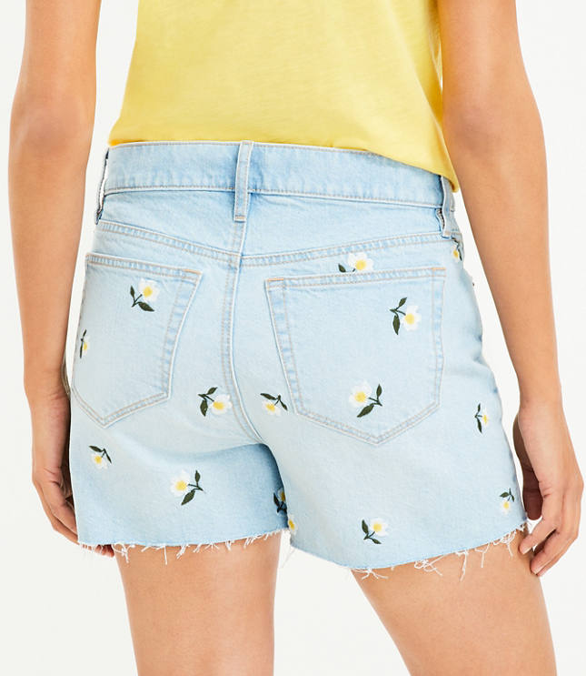 High Rise Frayed Cut Off Denim Shorts in Floral Embroidered Stone Wash