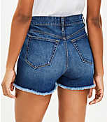 High Rise Frayed Cut Off Denim Shorts in Staple Mid Indigo Wash carousel Product Image 3
