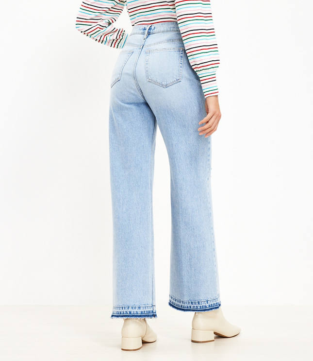 Far Out Light Wash High Rise Raw Hem Wide Leg Jeans