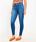 Curvy Chewed Hem Mid Rise Skinny Jeans in Bright Mid Vintage Wash carousel Product Image 1