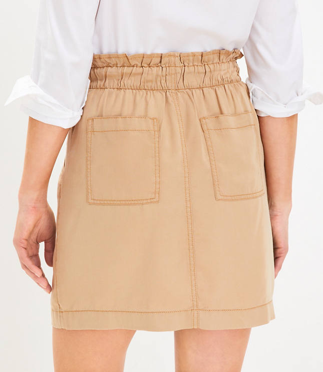 Paperbag skirt with clearance pockets