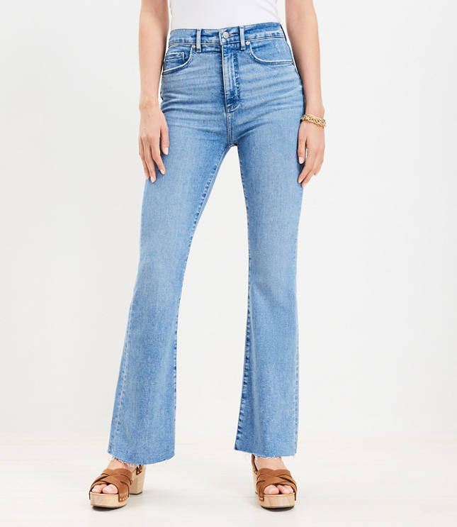 Petite Light Blue Wash Dip Low Rise Flare Jeans