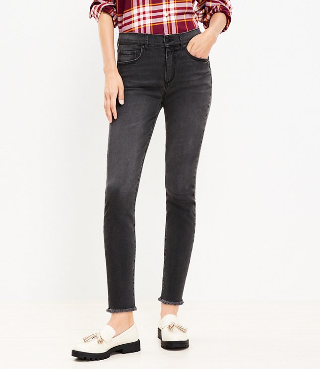 Petite Frayed Mid Rise Skinny Jeans in Washed Black Wash