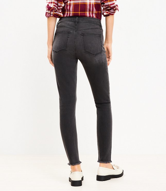 Petite Frayed Mid Rise Skinny Jeans in Washed Black Wash