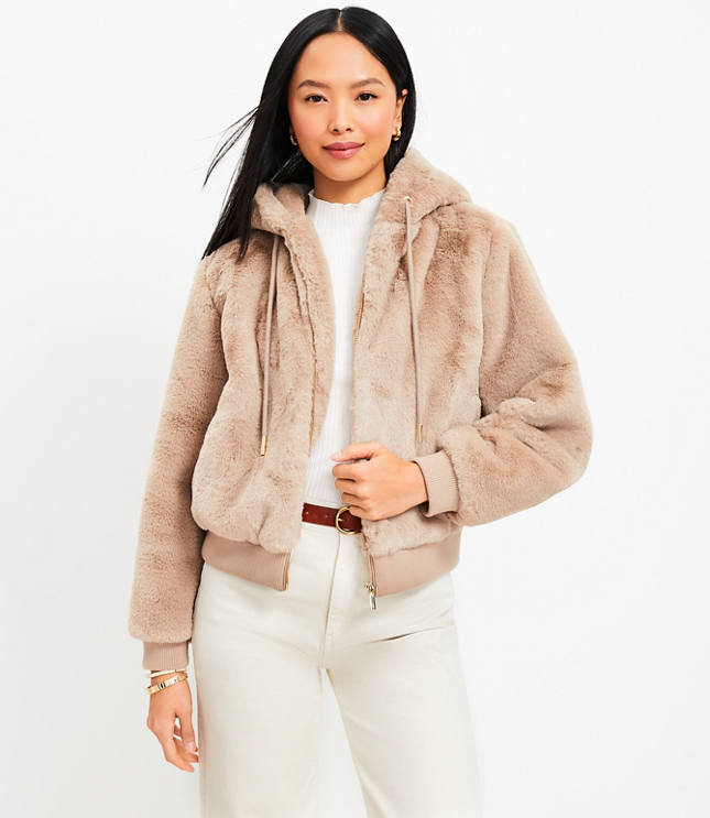 Tech bomber jacket with faux fur hood and online pockets