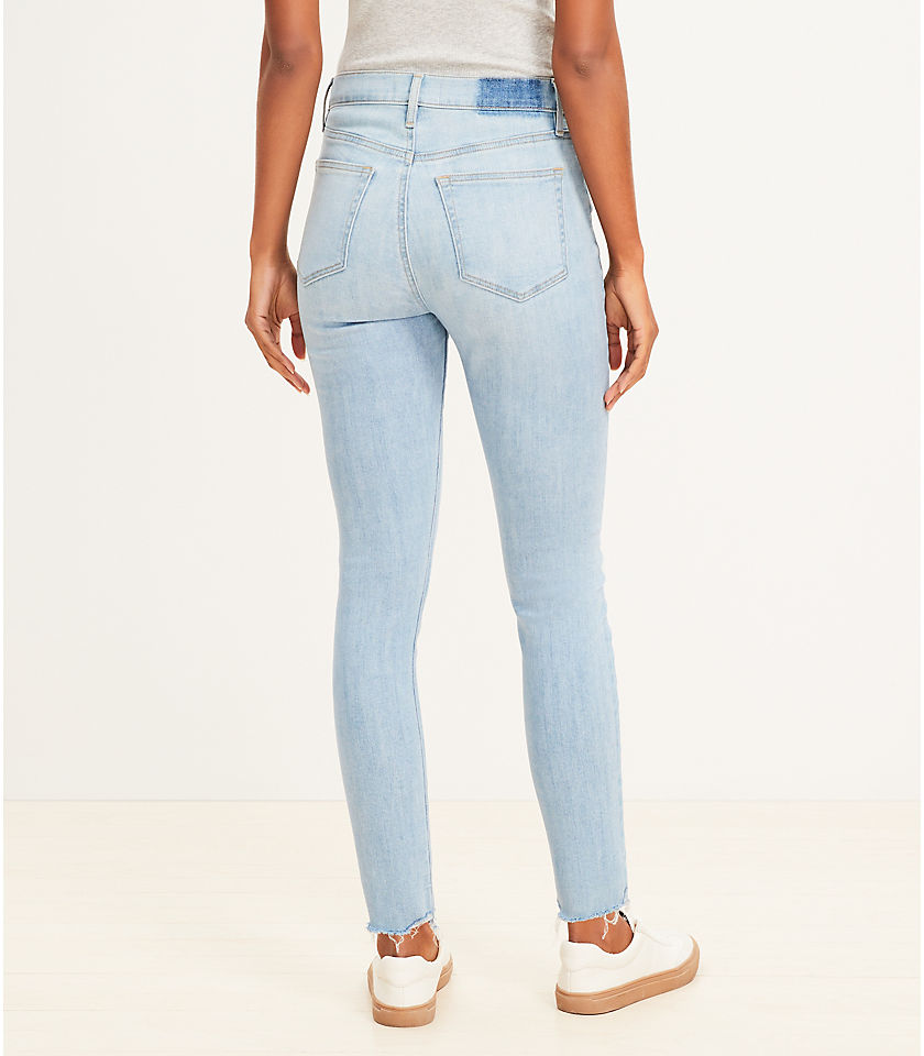 Petite Destructed Button Front High Rise Skinny Jeans in Light Wash