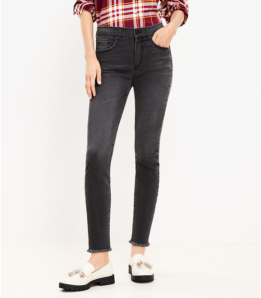 Frayed Mid Rise Skinny Jeans in Washed Black Wash