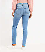 Petite Button Front High Rise Skinny Jeans in Destructed Mid Wash carousel Product Image 3