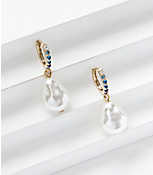 Pearlized Drop Huggie Earrings carousel Product Image 1