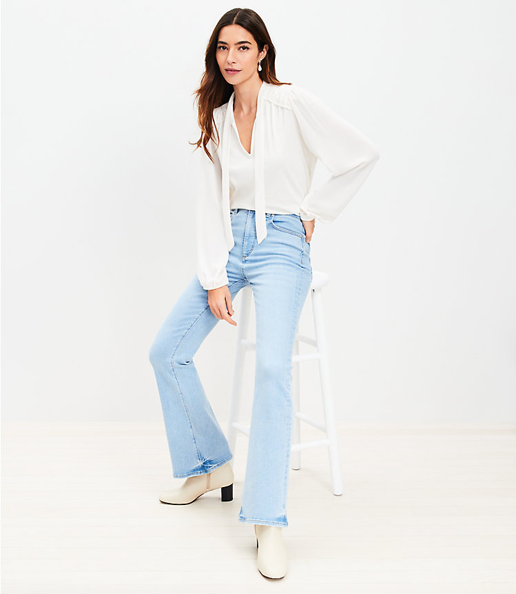 Petite High Rise Slim Flare Jeans in Light Wash image number 1