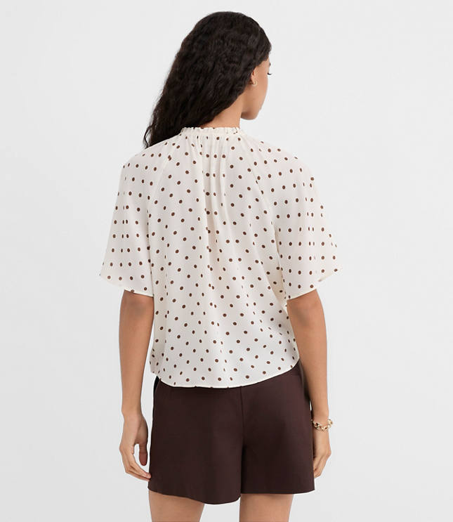 Dotted Ruffle Cuff Tie Neck Blouse