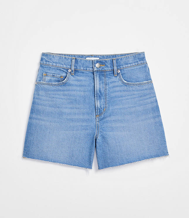 Rivete High Rise Cut Off Denim Shorts in Mid Wash