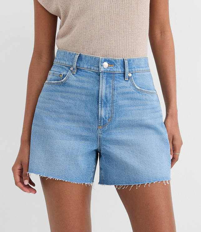 Rivete Petite Curvy High Rise Cut Off Denim Shorts in Mid Wash
